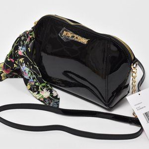 New Betsey Johnson black Xoanaya cross body purse with a scarf.